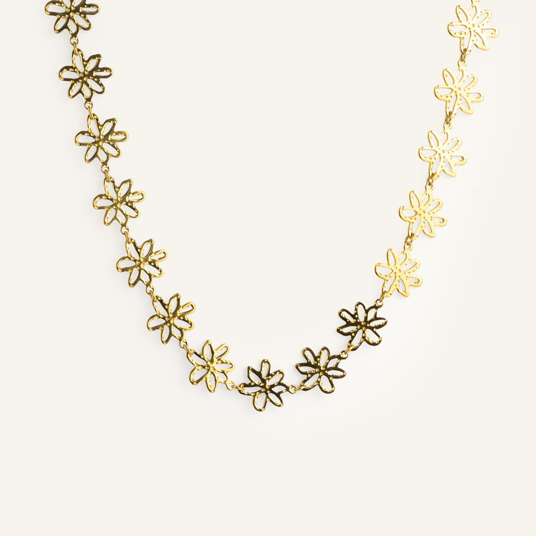 Collier fleur acier inoxydable doré